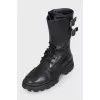 Black boots with a wide strap