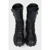 Black boots with a wide strap