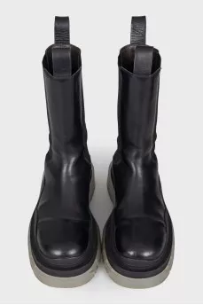 Leather boots with rubber soles