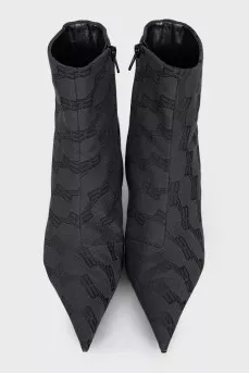 Ankle boots with heels in a signature print