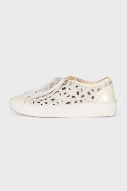 Laced sneakers with a signature logo