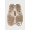 Laced sneakers with a signature logo