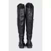 Black leather pointed toe boots