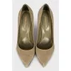 Green suede pumps
