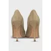 Green suede pumps