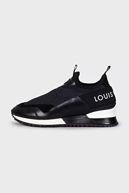 Black sneakers with embossed logo