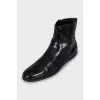 Black patent leather boots