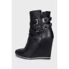 Black leather wedge ankle boots