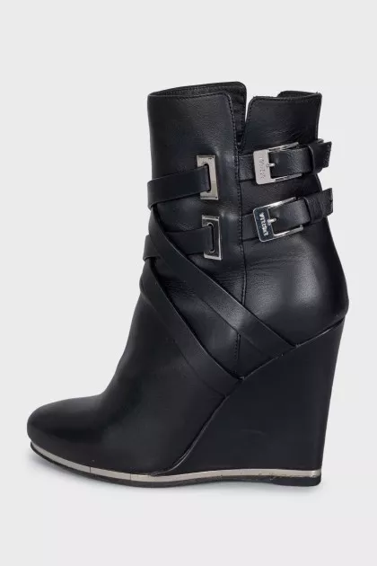 Black leather wedge ankle boots