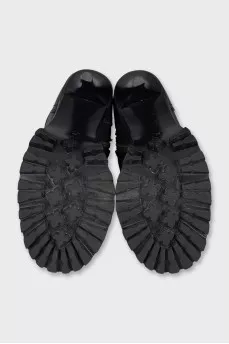 Leather ankle boots with a textured sole