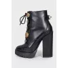 Ankle boots decorated with buttons