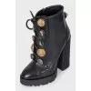 Ankle boots decorated with buttons