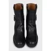 Black boots with metallic decor