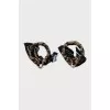 Round earrings made of metal and textile