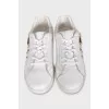 Leather sneakers with a branded patch