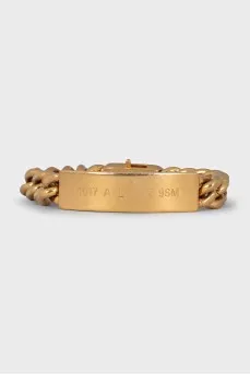 Golden bracelet with engraved logo