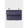 Leather bag with a wide strap