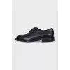 Black leather brogues