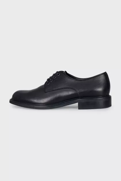Black leather brogues