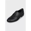 Black leather brogues