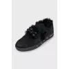 Suede slip-ons decorated with fur