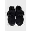 Suede slip-ons decorated with fur