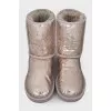 Gray Ugg boots decorated with sequins