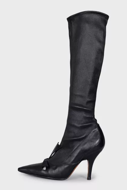 Black leather boots with a bow