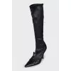 Black leather boots with a bow