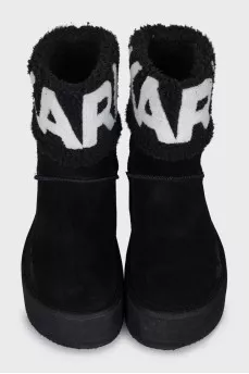 Suede Ugg boots with high soles