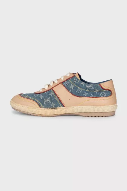 Leather and textile sneakers with a signature print