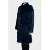 Mink coat on hooks