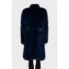 Mink coat on hooks