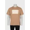 Men's brown T-shirt with brand logo