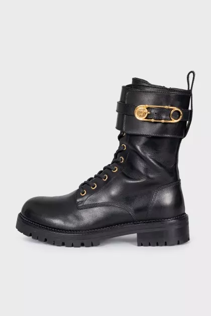 Leather boots with gold stiletto heels