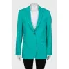Green jacket with a tag
