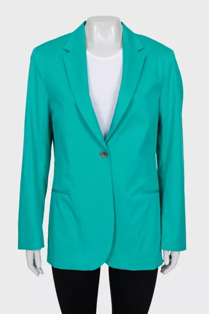 Green jacket with a tag