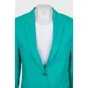Green jacket with a tag