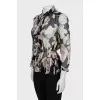 Sheer black blouse with floral print