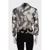 Sheer black blouse with floral print