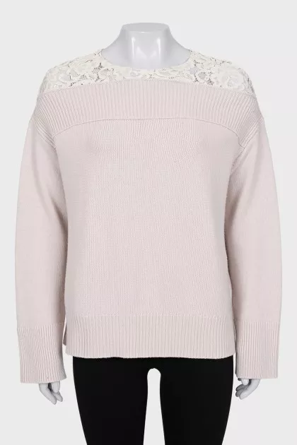 Wool jumper decorated with lace