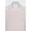 Wool jumper decorated with lace