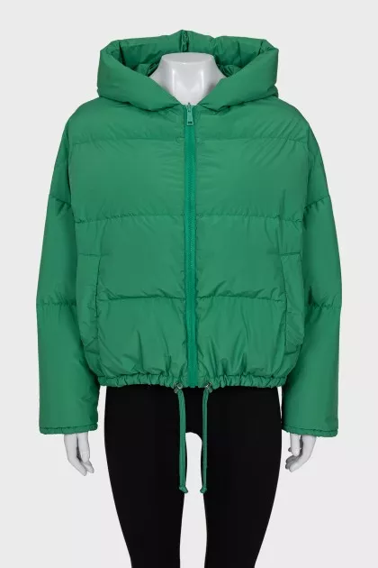 Reversible down jacket with a green hood
