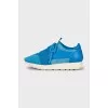 Light blue sneakers with leather inserts