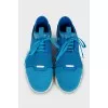 Light blue sneakers with leather inserts