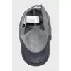 Gray cap with tag