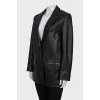 Straight-cut leather jacket with a button