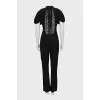 Fitted jumpsuit decorated with lace