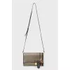 Bag with golden rivets