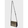 Bag with golden rivets